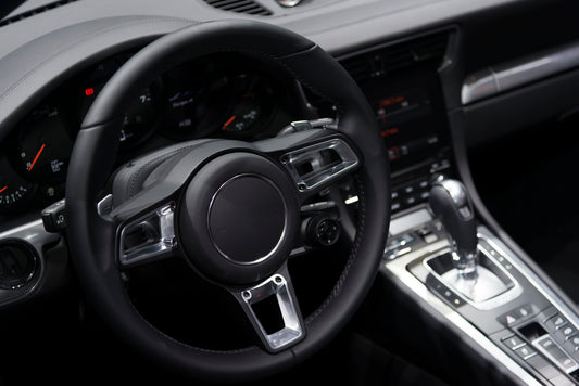 How do you fix a crooked steering wheel after an alignment?